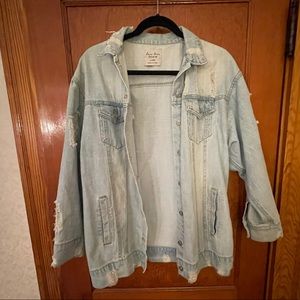 Ripped grungy light denim jacket